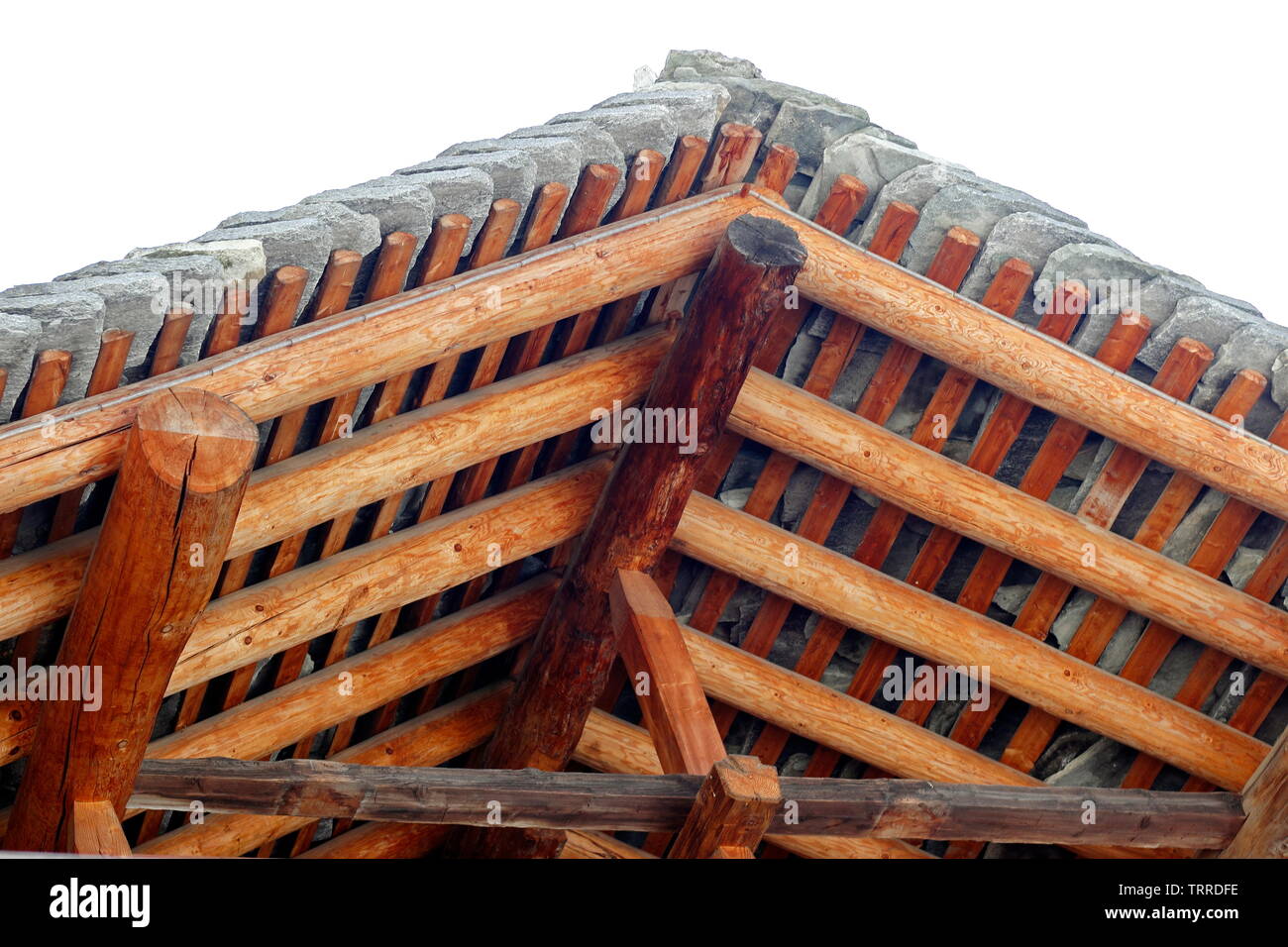 Italy Piedmont lakes area Lago d' Giulio Italian Alps Alagna Valsesia Valley traditional Walser wood buildings architecture stone roof and wood pole c Stock Photo