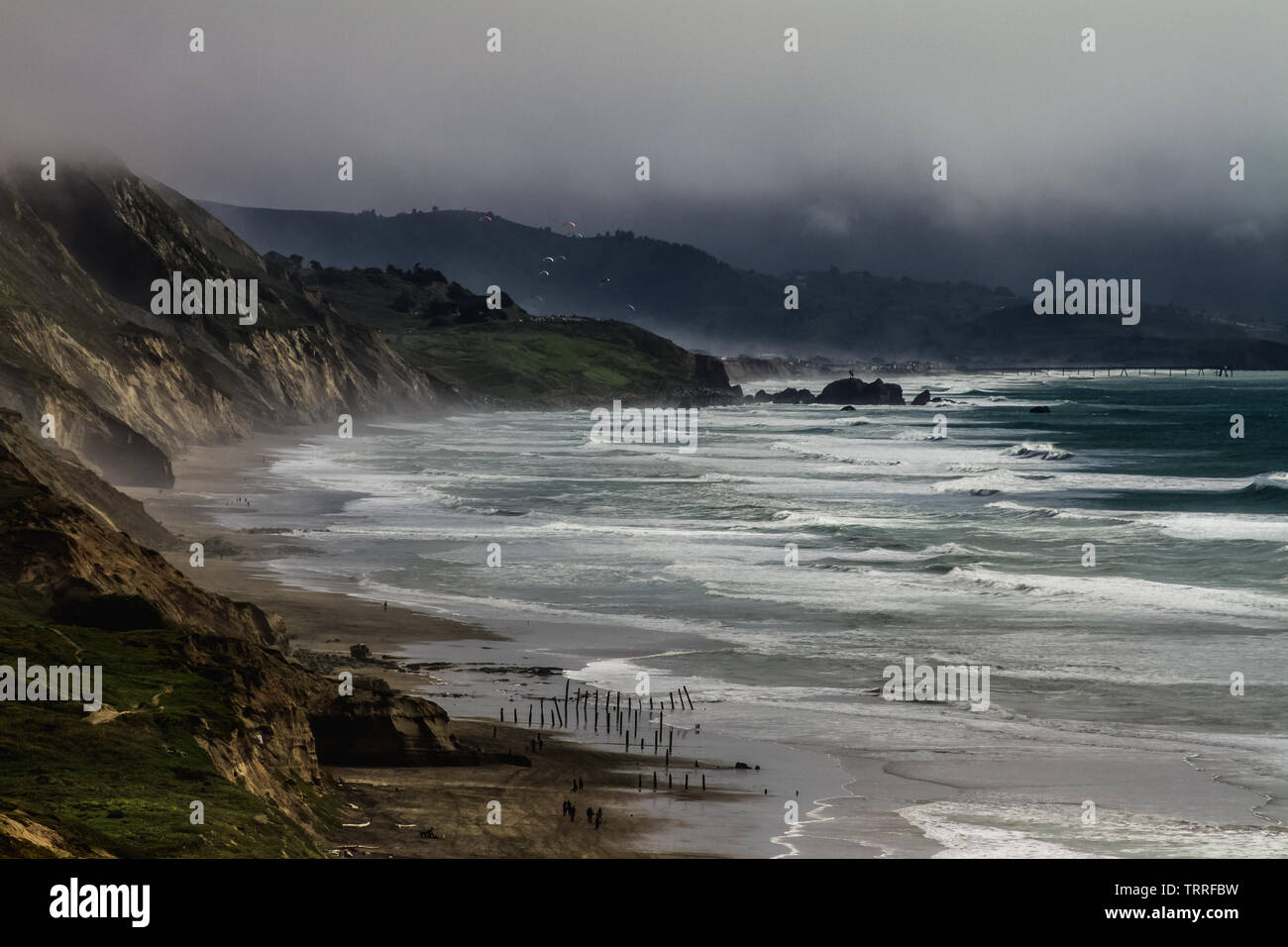 Sharp Park Beach Pacifica California summer morning fog rolling into the hills great location for fishing and just touring the California State beach Stock Photo