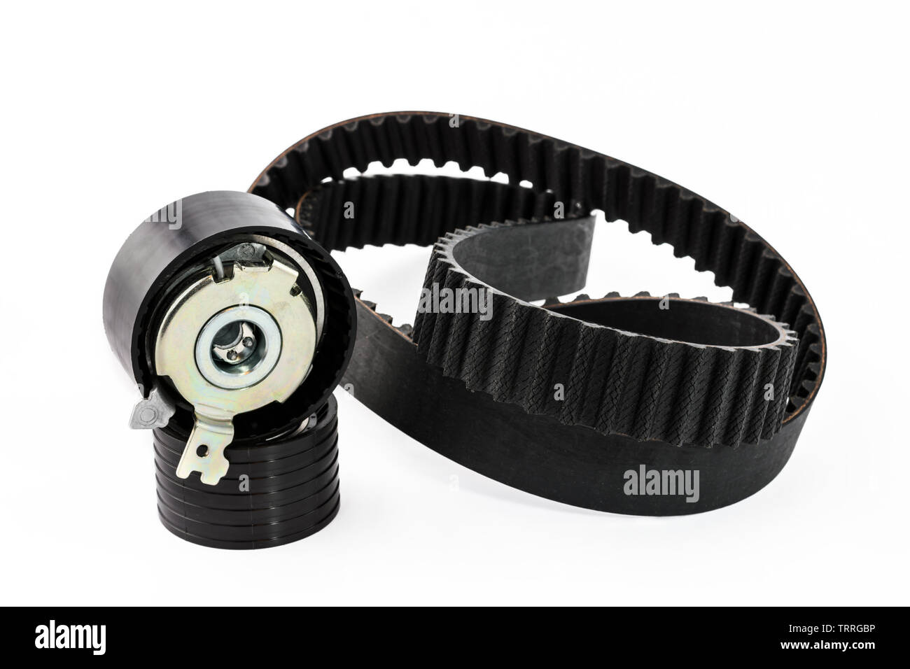 Spare parts for the car. The set of timing belt with rollers on a white background. Stock Photo