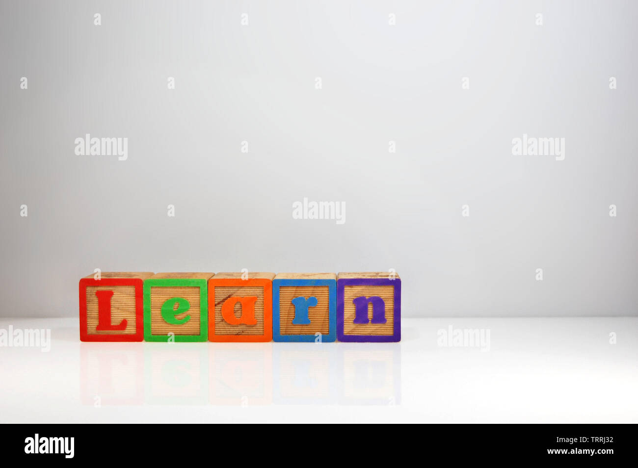 Stylized shot of “Learn� spelled out with ABC blocks. Stock Photo