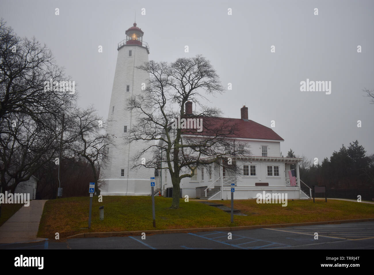Lighthouse in Sandy Hook, New Jersey, during daylight hours, with the