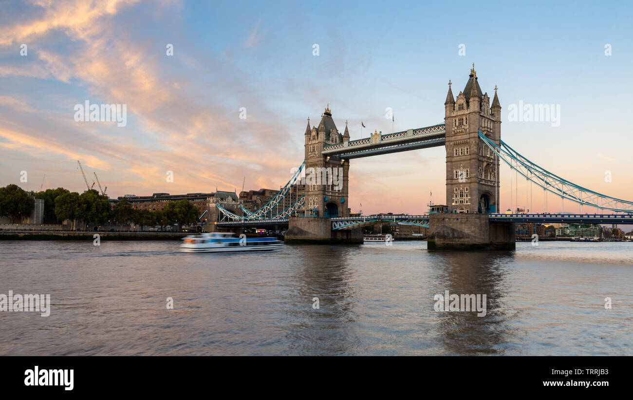 London, England, UK - September 27, 2018: Clouds light up over London's iconic Tower Bridge at sunset. Stock Photo
