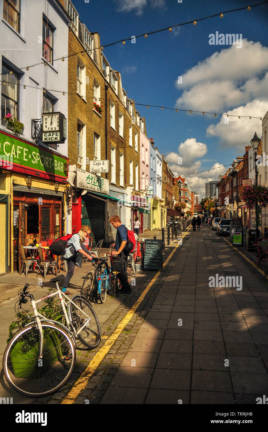 London, England, UK - September 18, 2011: Sun shines on the independent shops and cafes of Exmouth Market in central London. Stock Photo