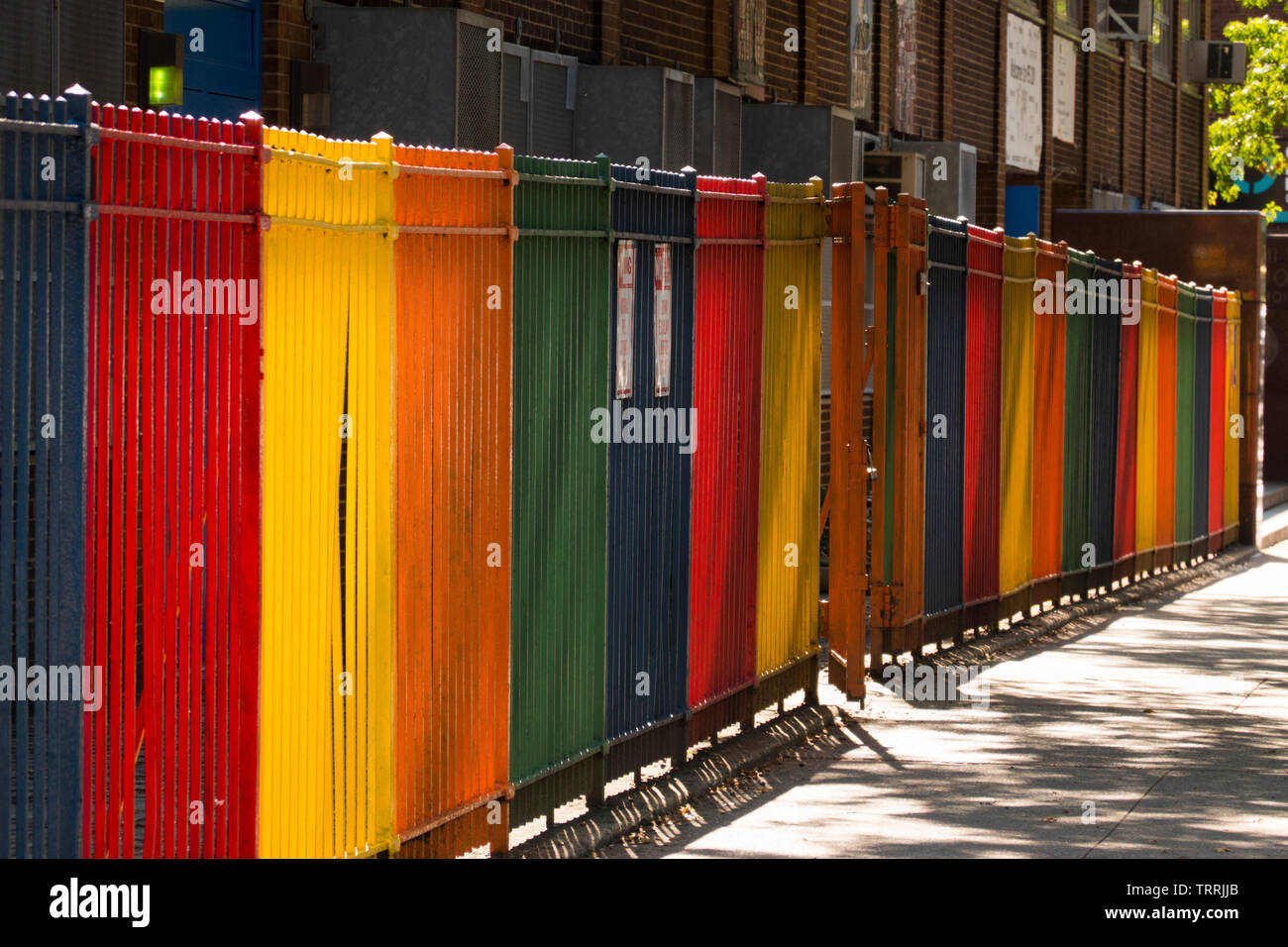 colorful fence on Essex street in Manhattan NYC Stock Photo