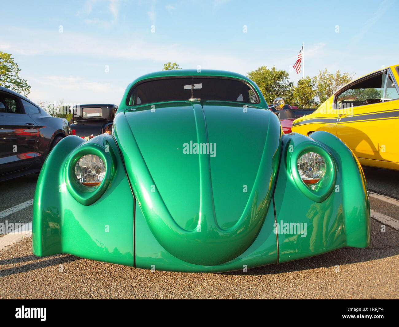 Custom green VW Beetle at a NJ car show with radical bodywork and extremely low stance. Stock Photo