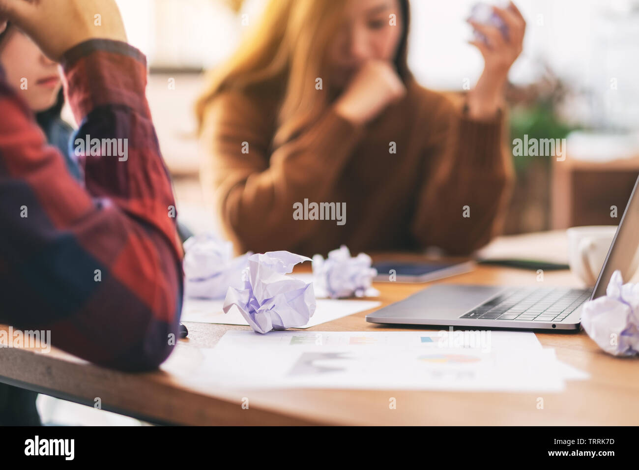 Three businessman get stressed while having a problem in business meeting Stock Photo