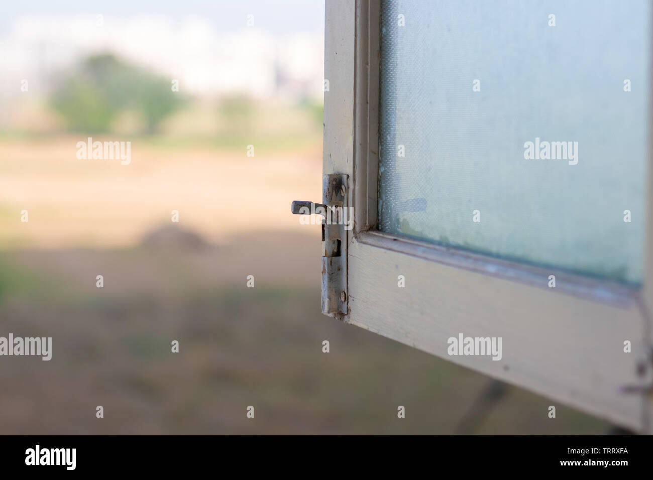 Open Window, blurry outside view through window Stock Photo