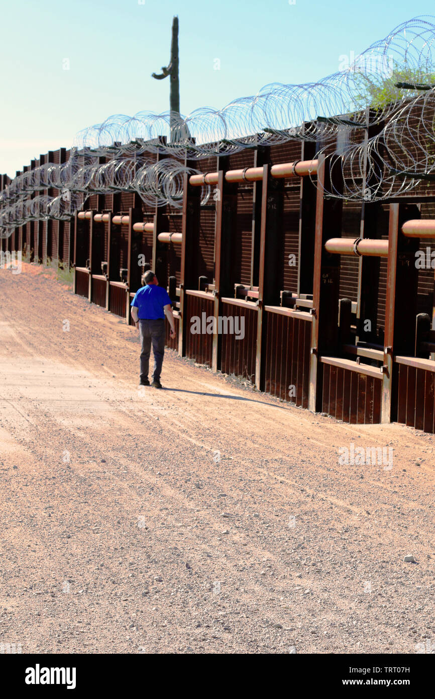 A quality assurance (QA) specialist with Task Force Barrier visited a portion of the Tucson Sector to do reconnaissance of the existing barrier June 8, 2019. The QA noted the presence of flash flood gates, access gates, harsh conditions, areas where the barrier had been cut and repaired, and steep grades, making some areas difficult to reach. Stock Photo