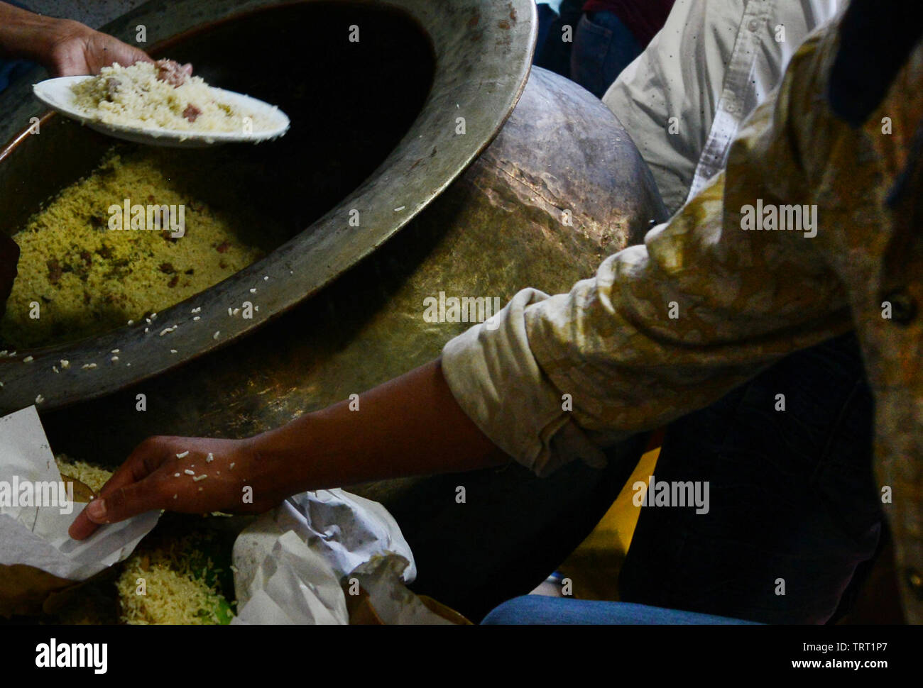 A small shop selling Biryani ( Savory rice & meat dish ) in Dhaka