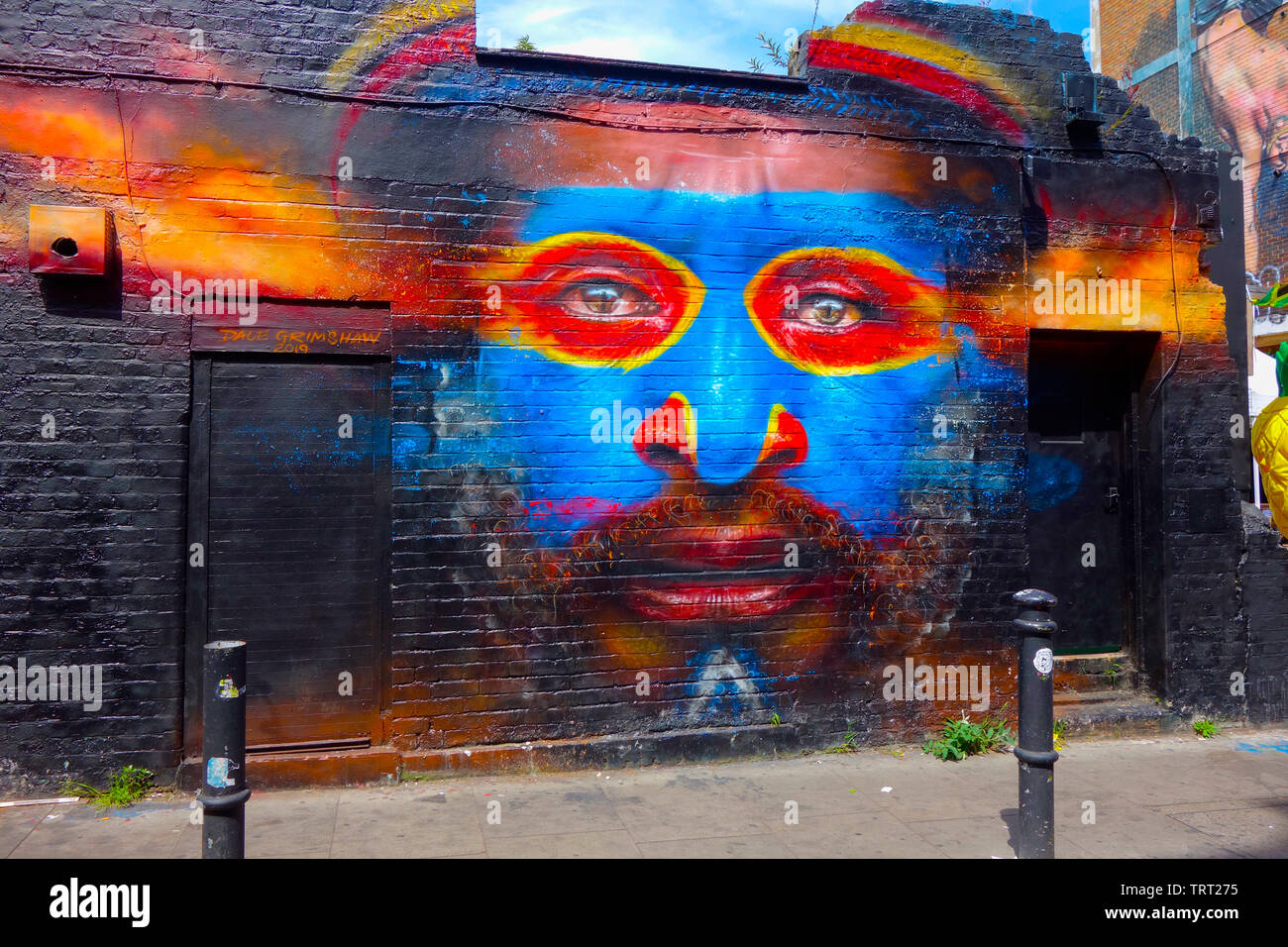 Colourful Graffiti on walls - Brick Lane, East London. Stock Photo