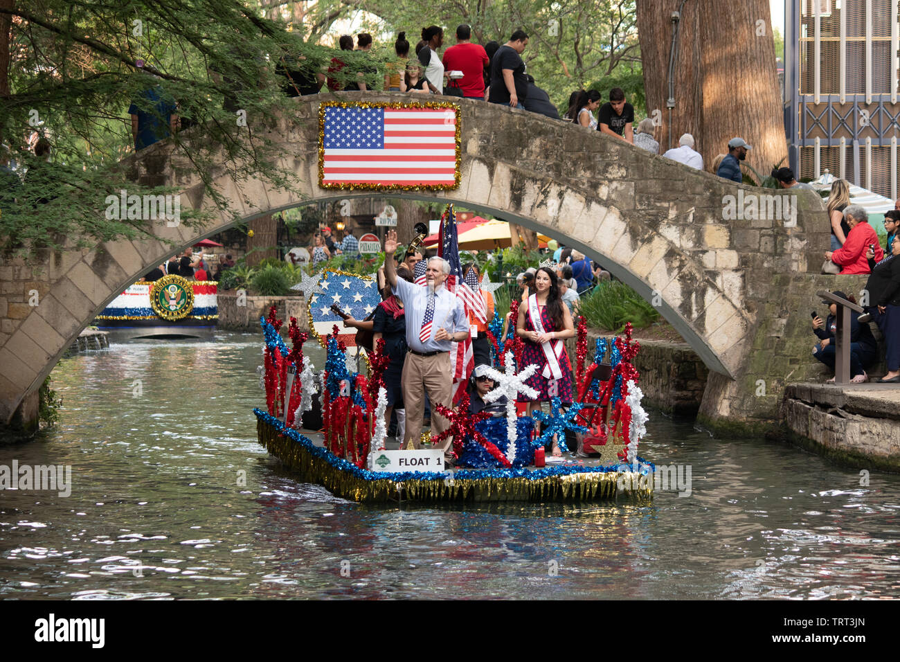 The annual veterans services parade taking place along the River Walk in San Antonio, Texas, USA Stock Photo