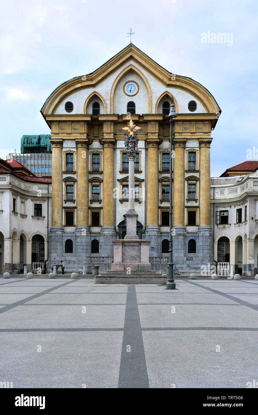 Facade of the Ursuline Holy Trinity church, Congress square, Ljubljana city, Slovenia, Europe Stock Photo