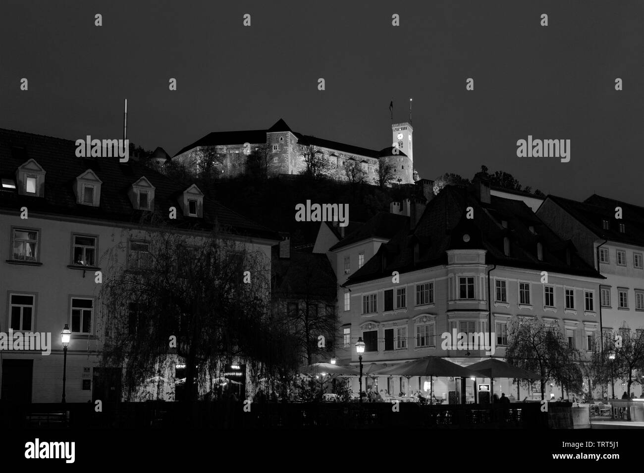 The castle and Ljubljanica River at dusk, Ljubljana city, Slovenia, Europe Stock Photo