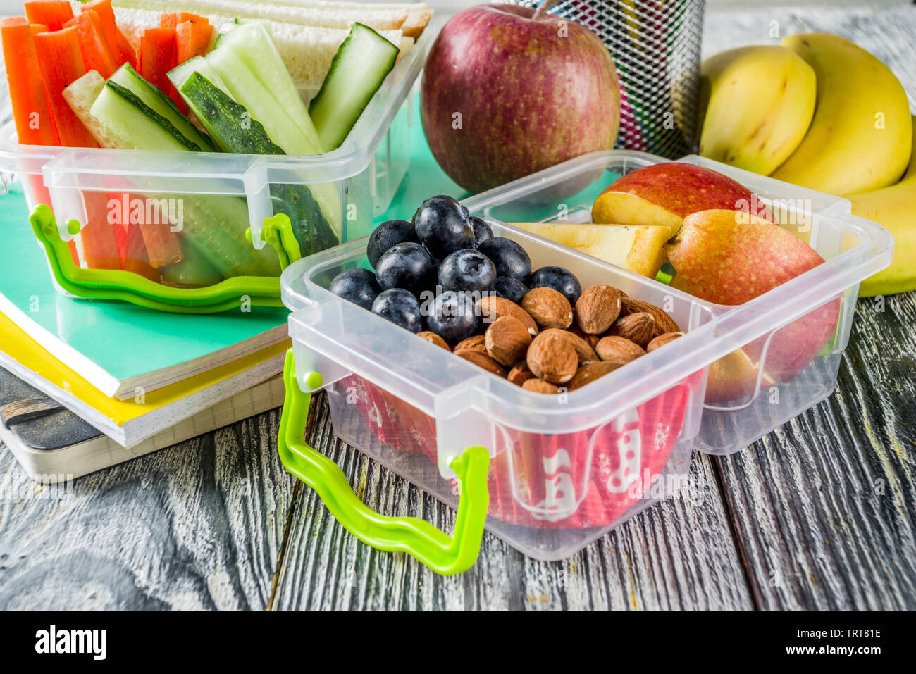 Healthy school lunch box. Kid s lunch box with sandwiches fruit