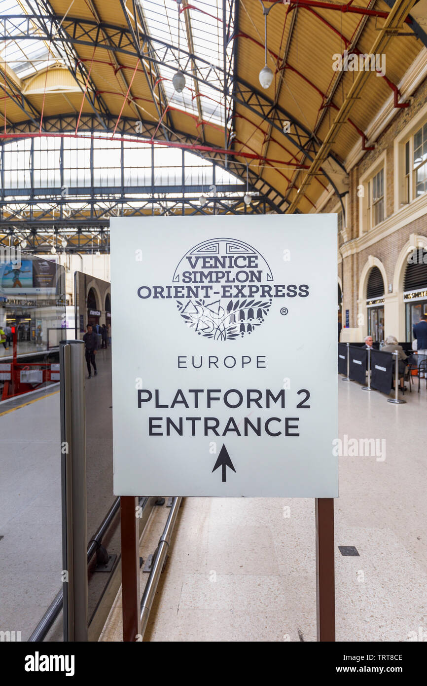 Belmond Venice Simplon Orient Express departure lounge check-in point entrance direction sign at Platform 2 Victoria Station, London SW1 Stock Photo