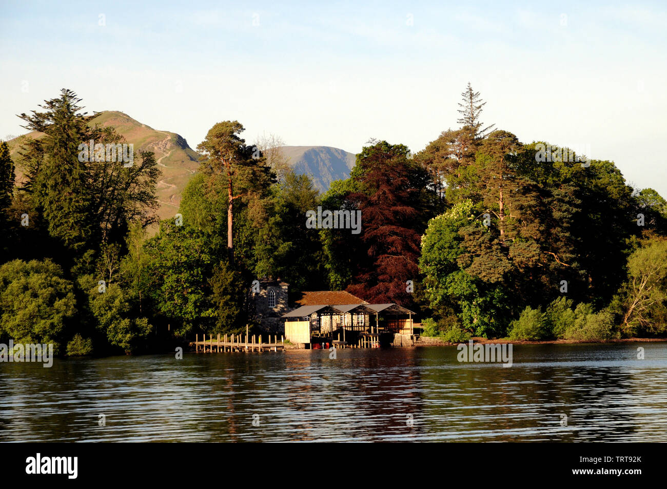 Boathouse nestles on Derwent Isle, an island as its name implies on Derwentwater, Keswick, in the English Lake District Stock Photo