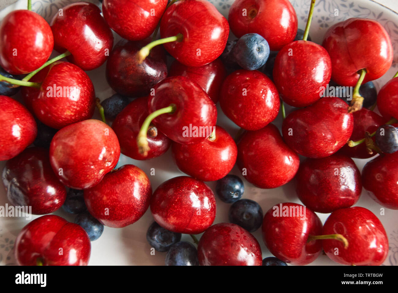 group of natural cherries Stock Photo Alamy