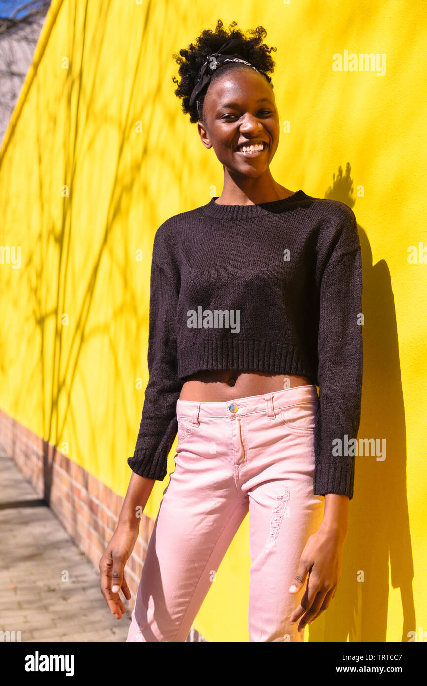 pink jeans and black top