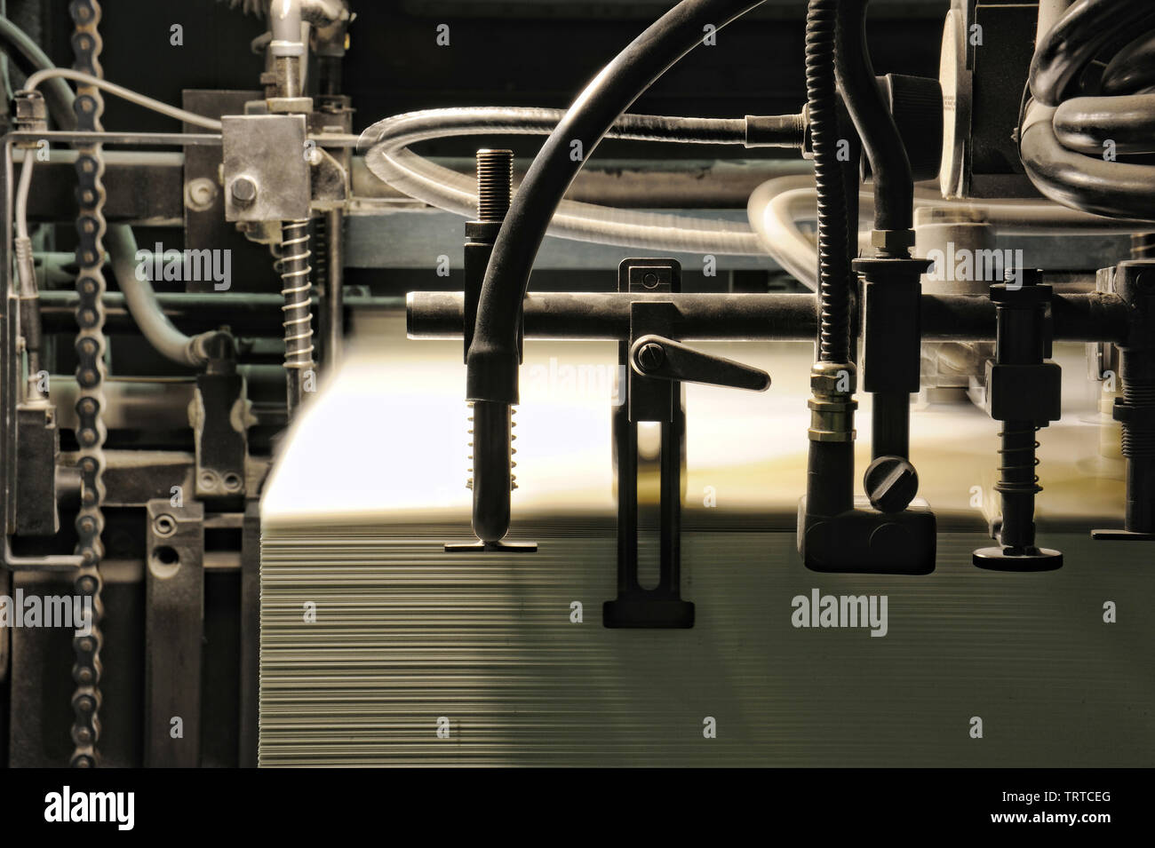 detail sheet feeder for offset printing machine during production Stock