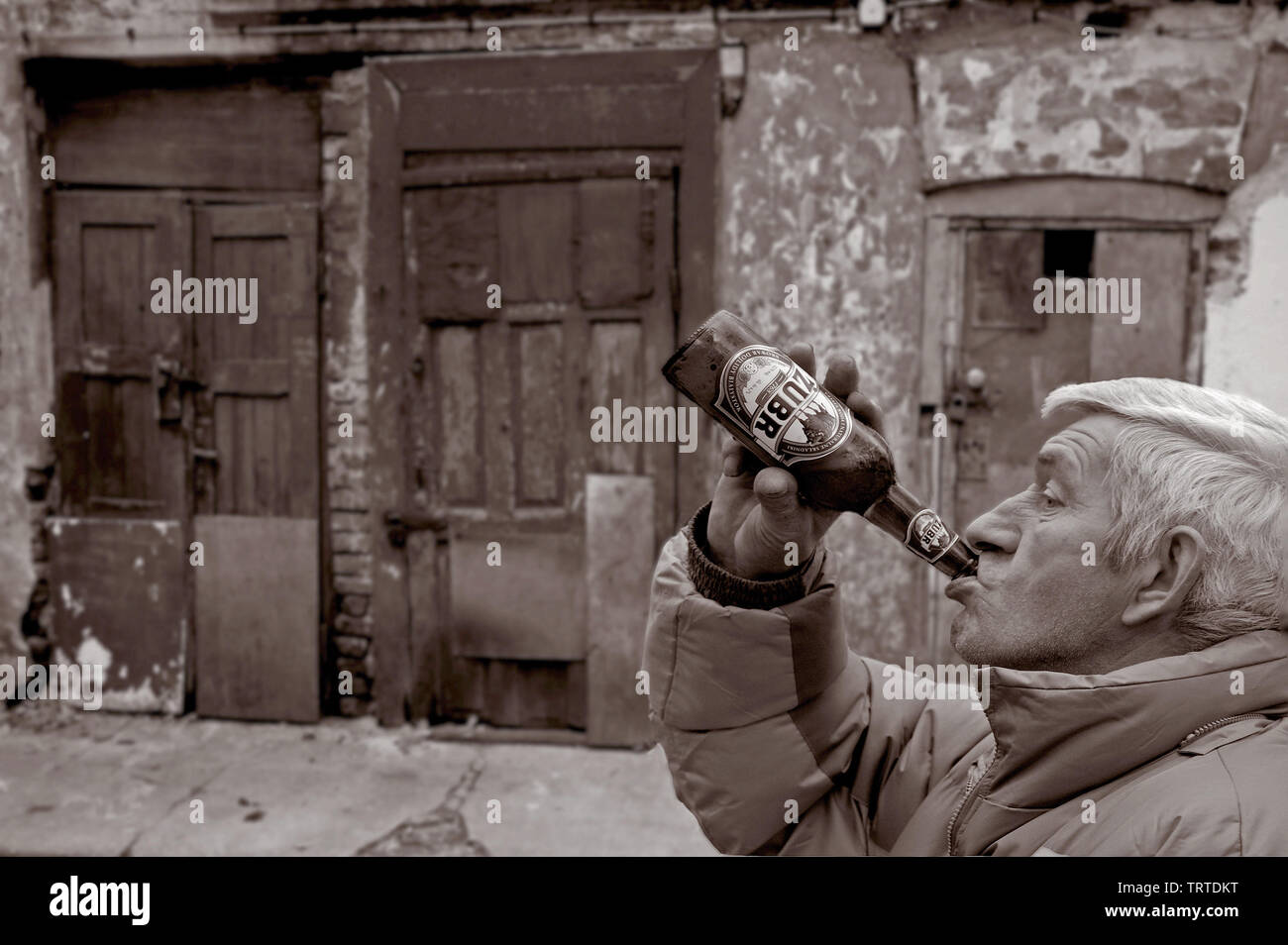 Man drinking from bottle Stock Photo