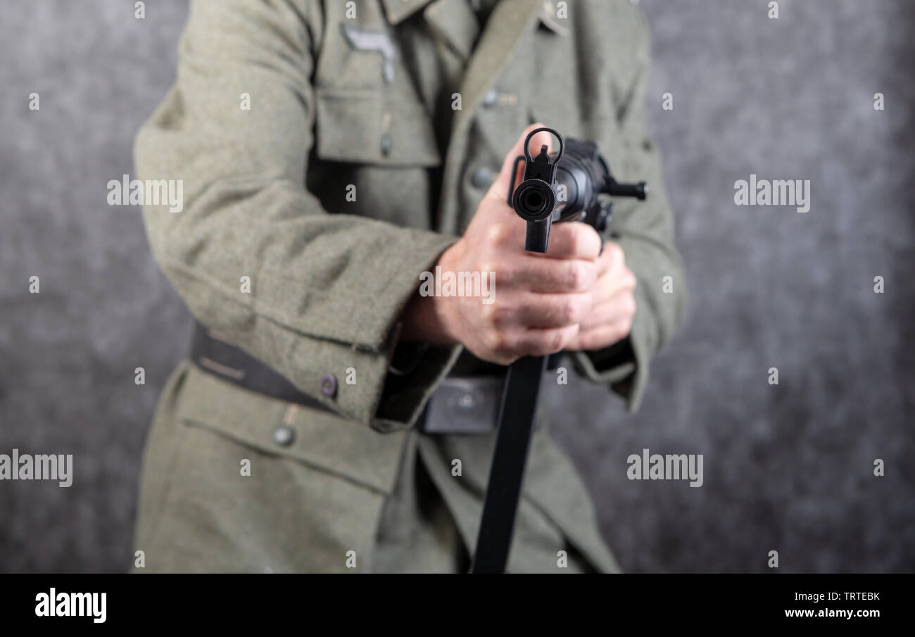 a world war two German soldier with machine gun MP 40, close-up Stock Photo