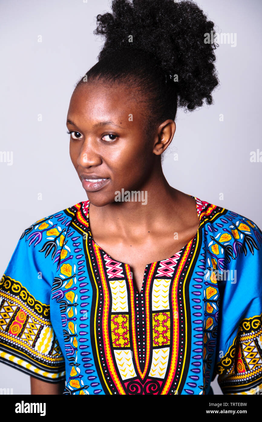 Young south african zulu or maasai woman in traditional clothes in studio Stock Photo