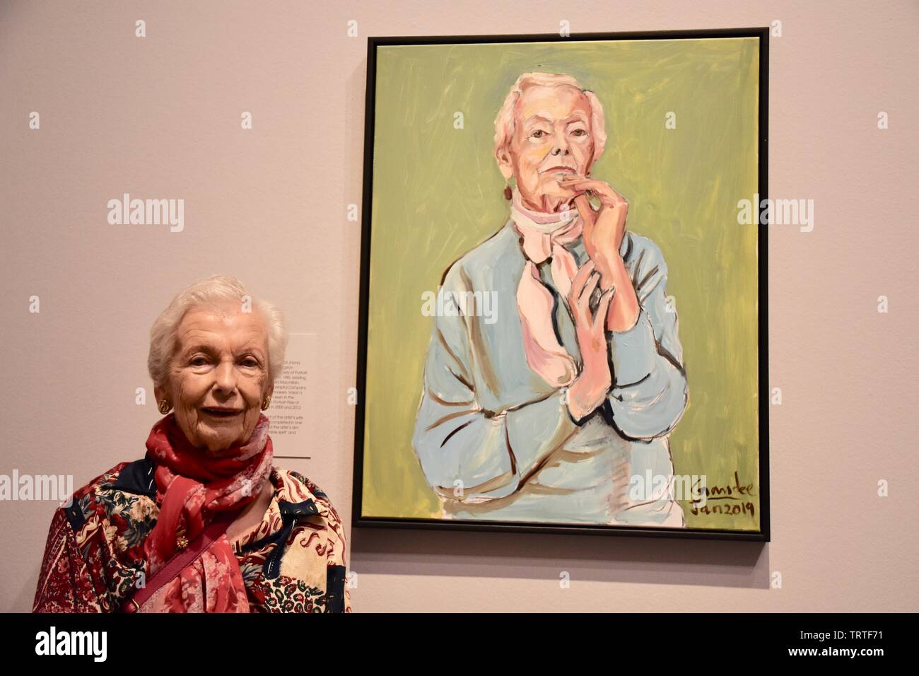 London, UK. Model Theresa poses with Aunty Theresa by Gandee Vasan, BP Portrait Award 2019 Press Day, The exhibitions runs from 13 June to 20 October 2019. National Portrait Gallery, St Martin's Place, London. UK Credit: michael melia/Alamy Live News Stock Photo