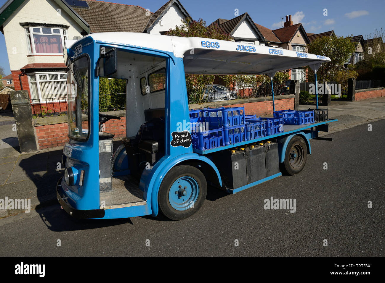 An original milk float still in use in Wirral England UK Stock Photo ...
