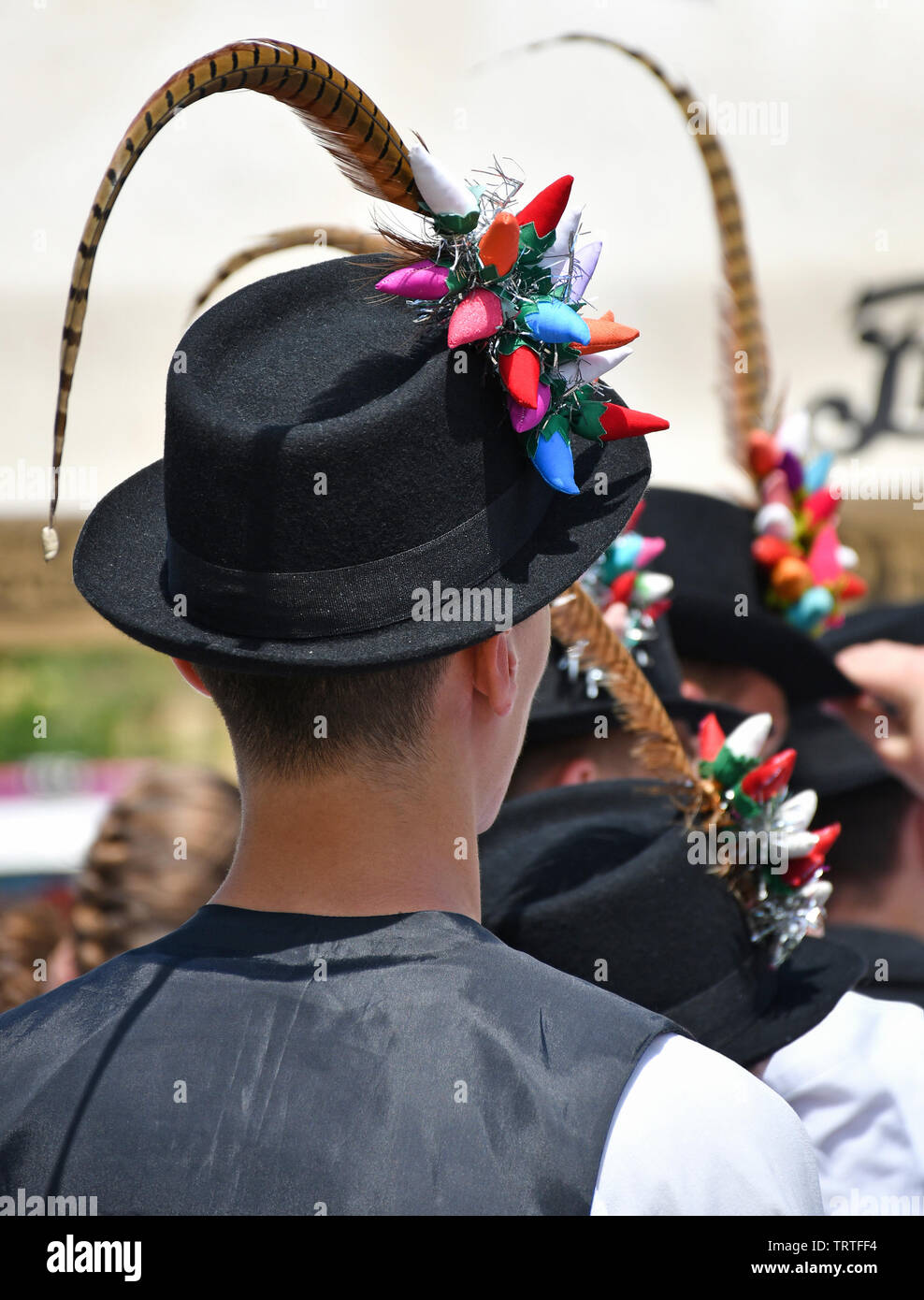 Folk dancer men in strange hat Stock Photo