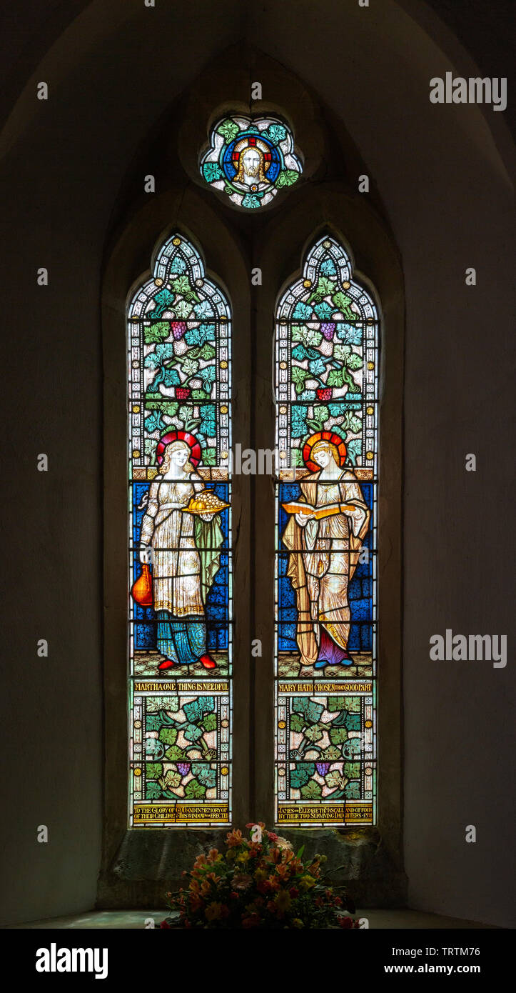 Stained glass window Kington St Michael church, Wiltshire, England, UK - Mary and Martha 1891 by Powell and Sons Stock Photo