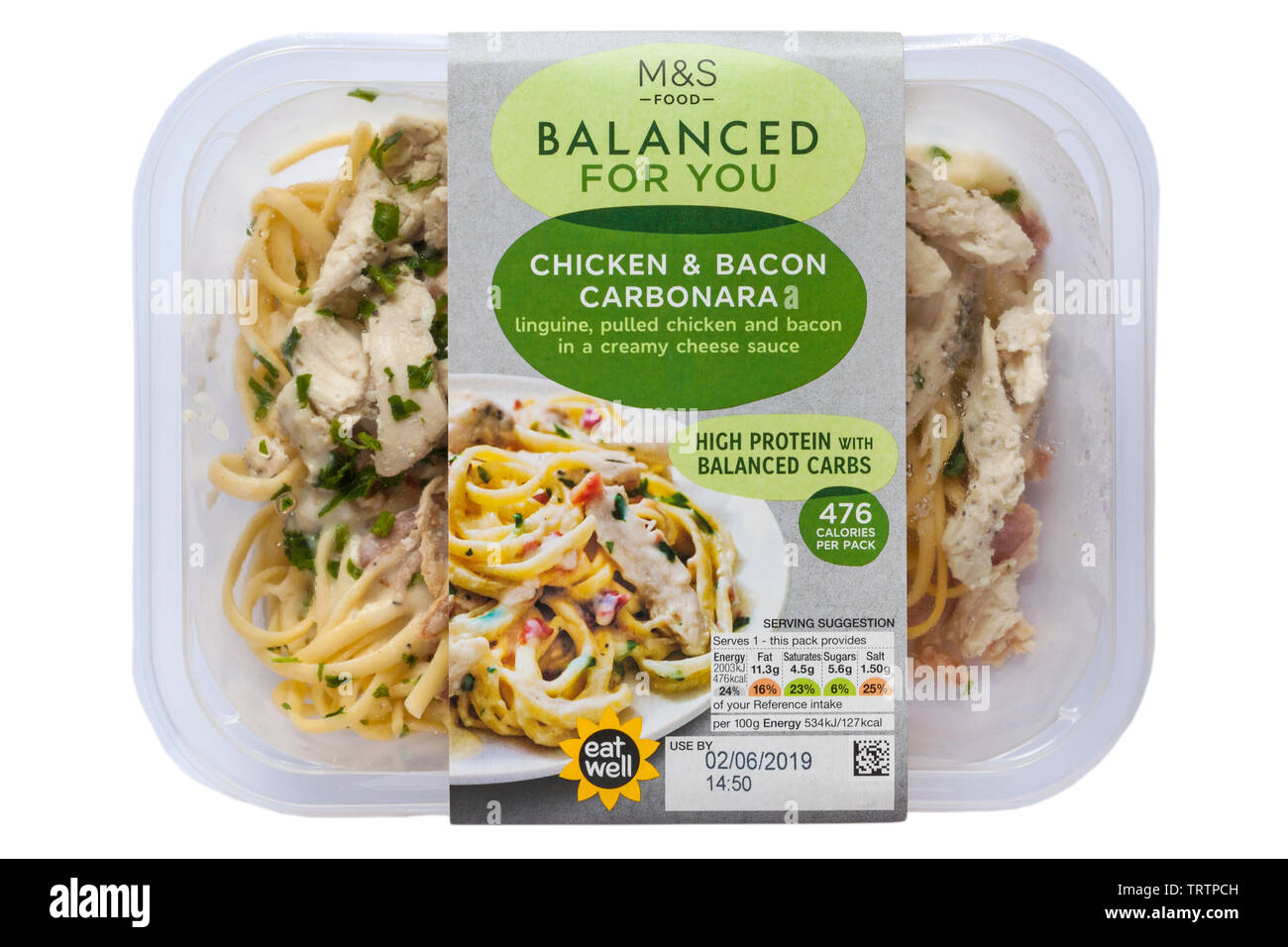 Pack of Chicken & Bacon Carbonara M&S Food Balanced for You isolated on white background - linguine pulled chicken and bacon in a creamy cheese sauce Stock Photo