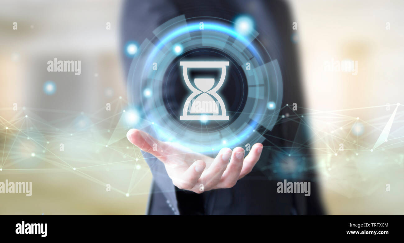 businessman hand with digital technology sand clock concept Stock Photo