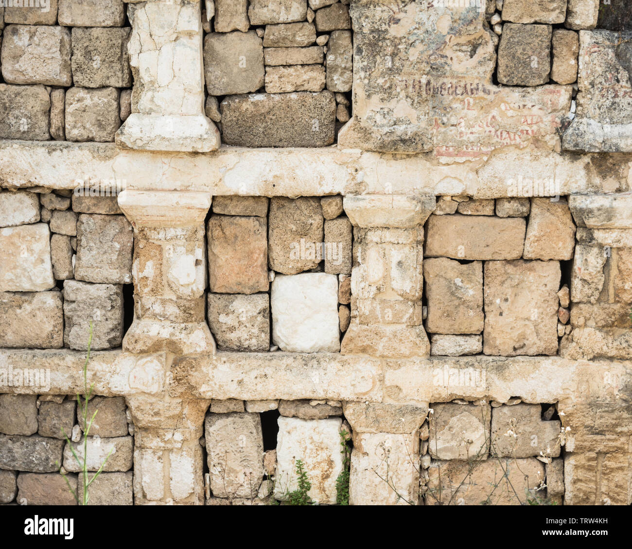 Detail of the columbarium with fading inscriptions in Al Bass archaeological site's cemetery, Tyre, Lebanon Stock Photo
