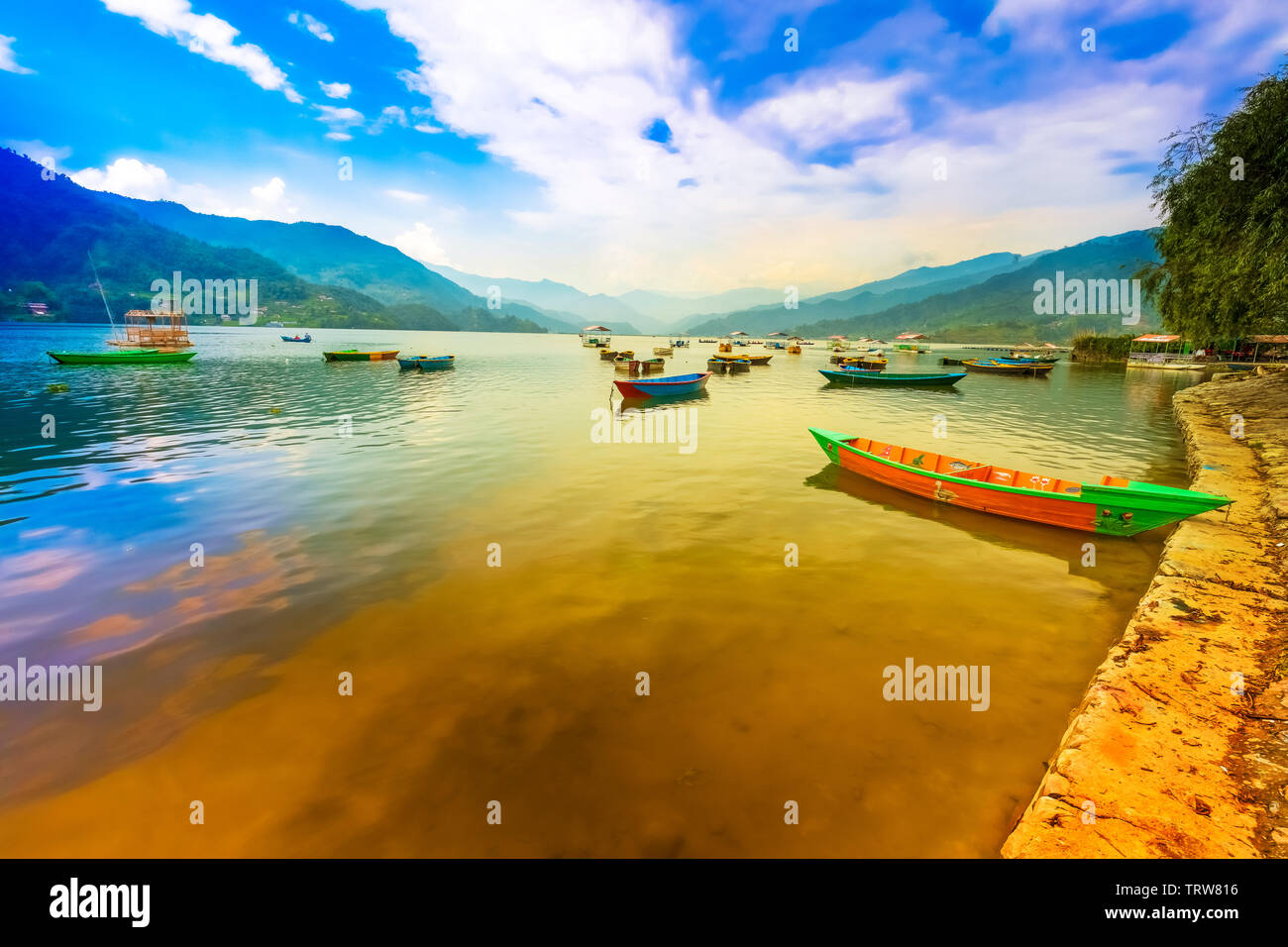 Passenger Boats Parking in phewa lake Sunset on Background. Pokhara Nepal Stock Photo