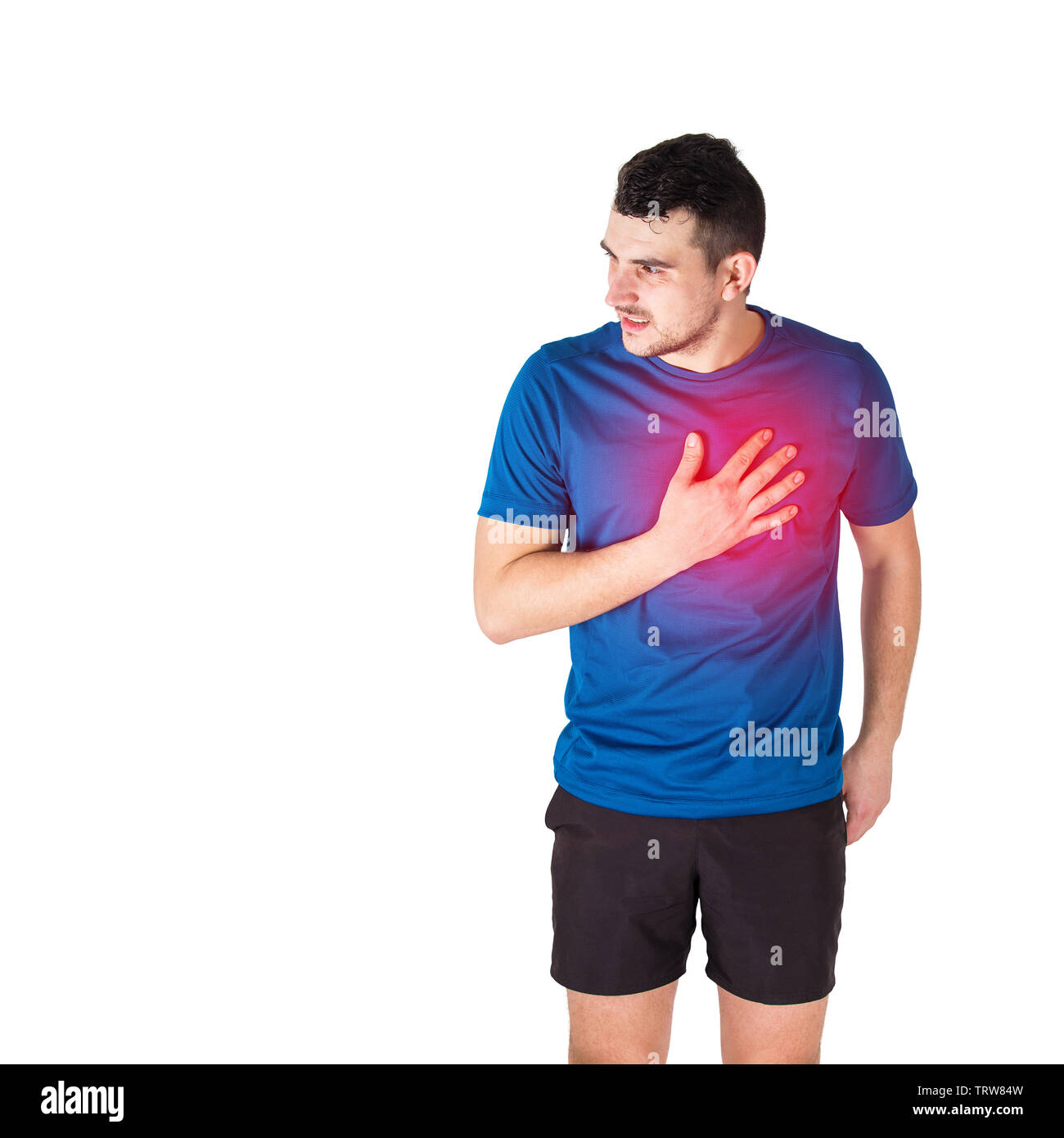 Caucasian man athlete looking aside feeling heart attack or chest pain isolated over white