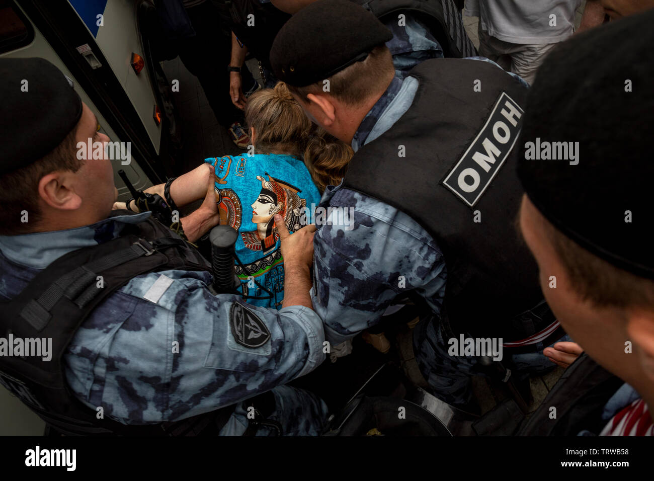 Moscow, Russia. 12th June, 2019 Police officers detain people during a rally in support of Russian journalist Ivan Golunov who was earlier released from custody in Moscow, Russia Golunov, who works for the online news portal Meduza, was detained on 6th June 2019 in central Moscow on suspicion of drug dealing Stock Photo