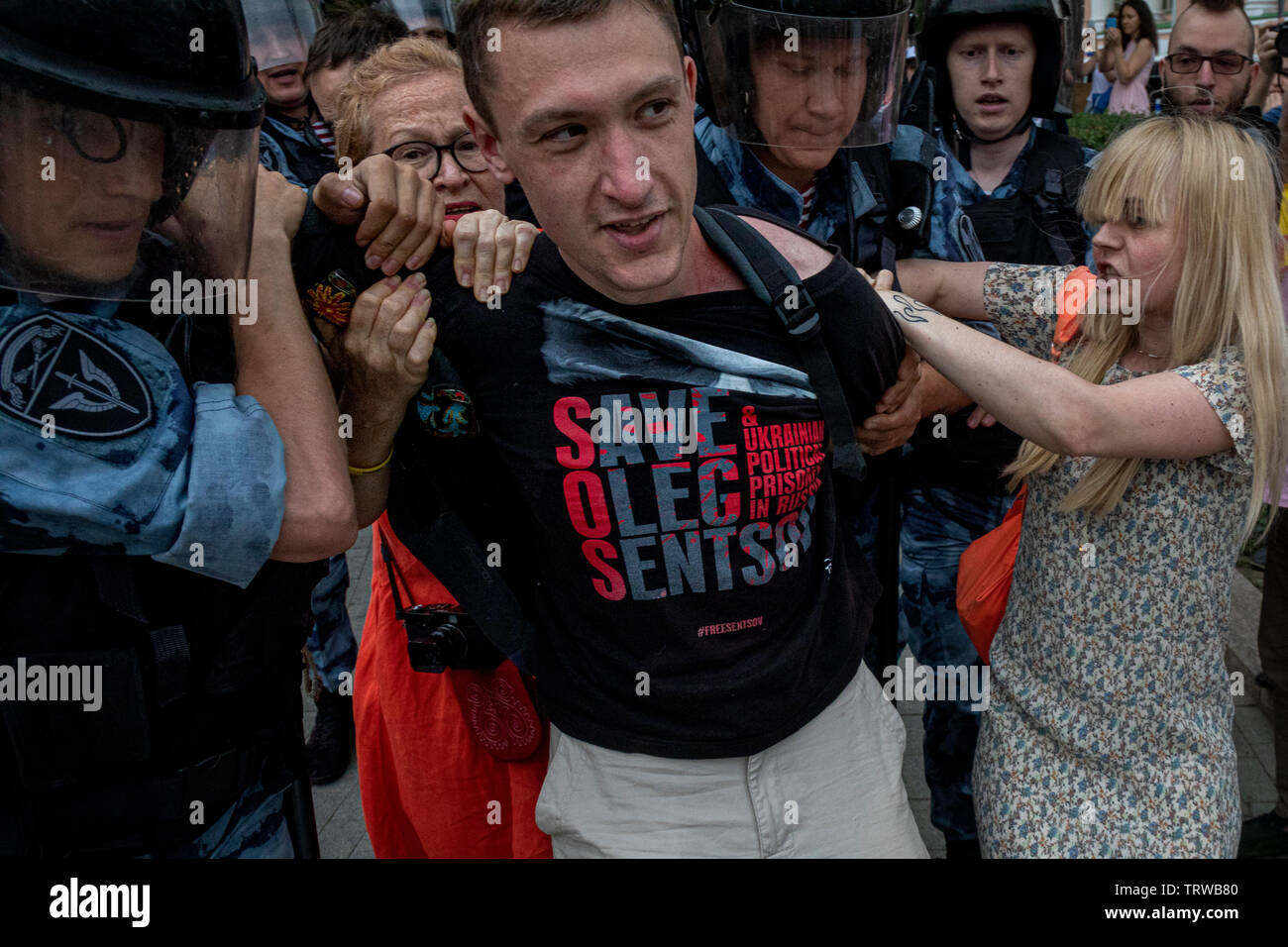 Moscow, Russia. 12th June, 2019 Police officers detain opposition activist Konstantin Kotov during a rally in support of Russian journalist Ivan Golunov who was earlier released from custody in Moscow, Russia. Golunov, who works for the online news portal Meduza, was detained on 6th June 2019 in central Moscow on suspicion of drug dealing Stock Photo