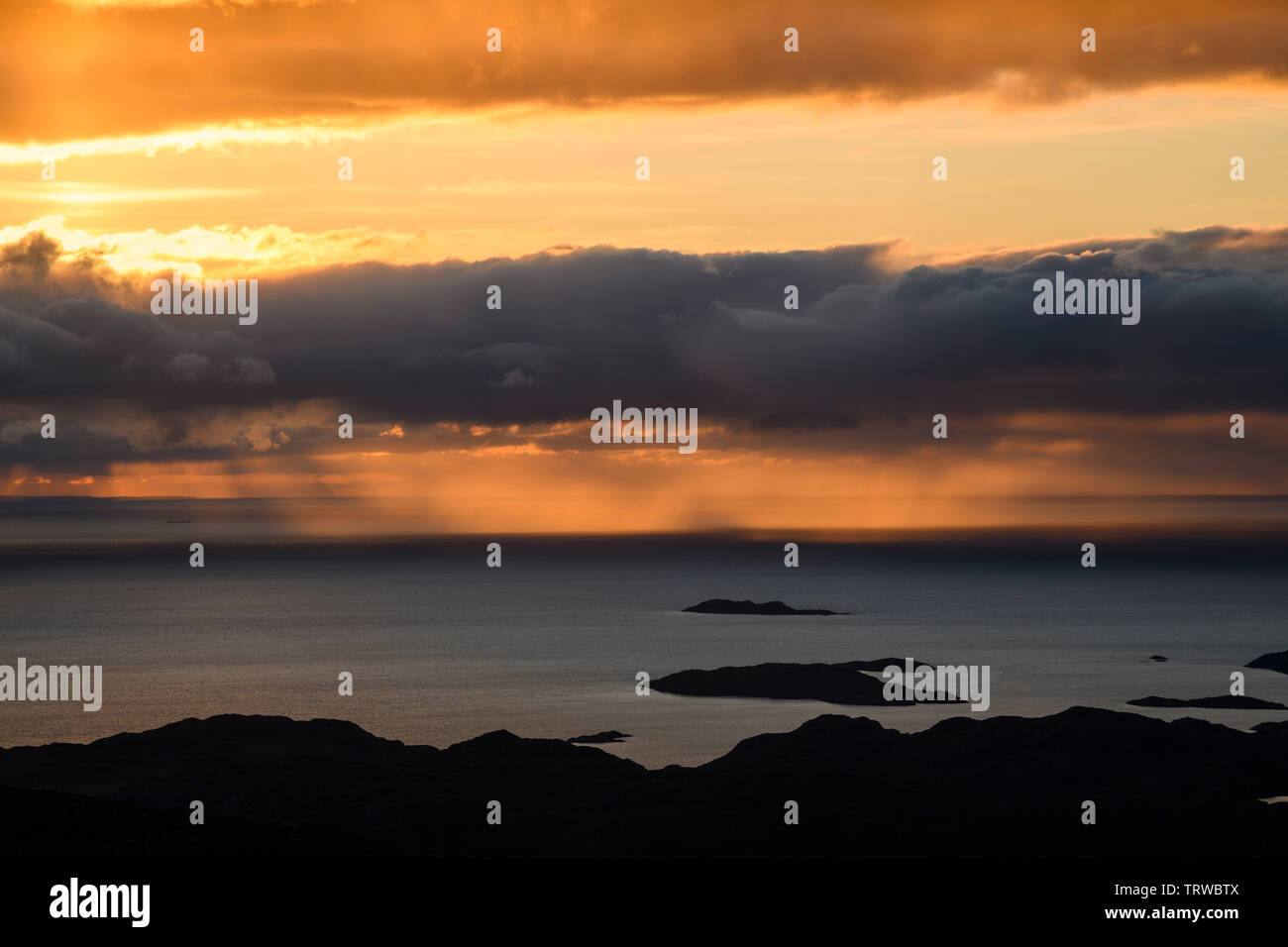 Rain shower and sunset, View from Stac Pollaidh, Coigach peninsula, Wester Ross, Highlands, Scotland Stock Photo