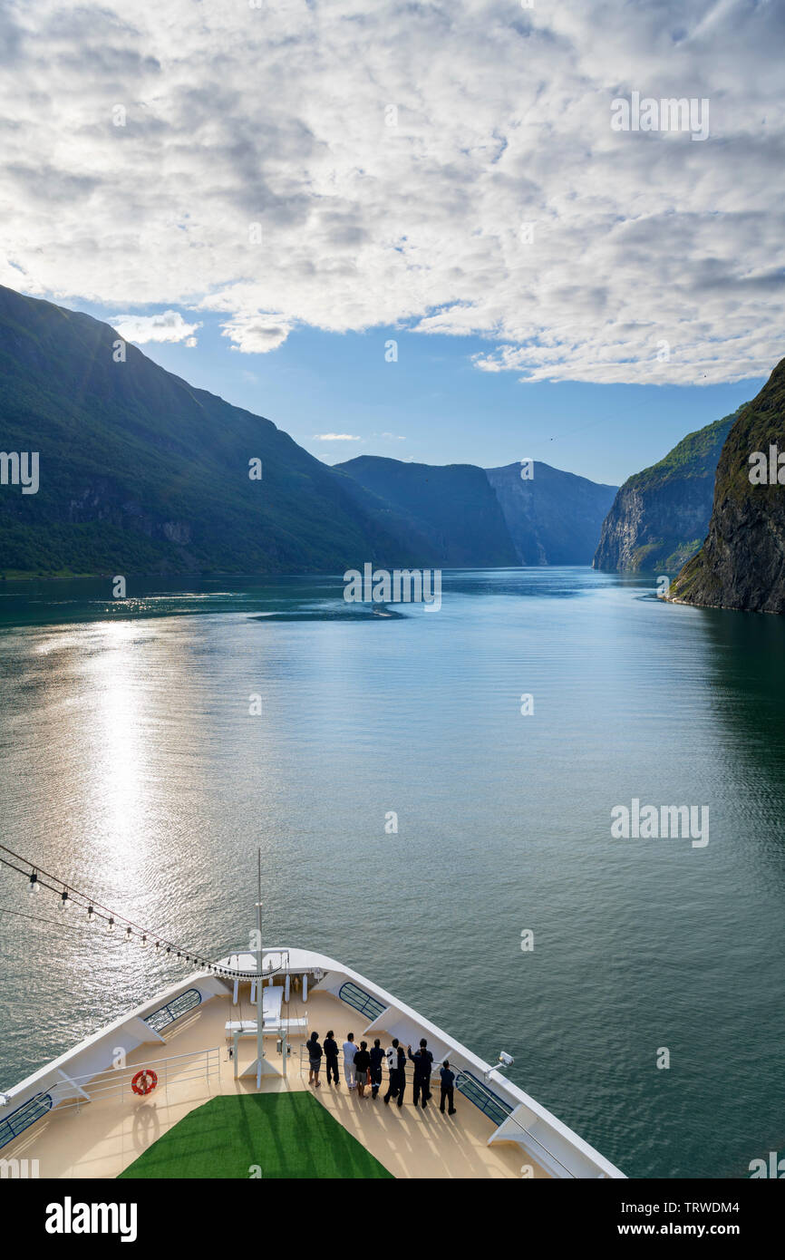 The TUI cruise ship Marella Explorer sailing out of Flåm through the Aurlandsfjorden, Sognefjord, Sogn og Fjordane, Norway Stock Photo
