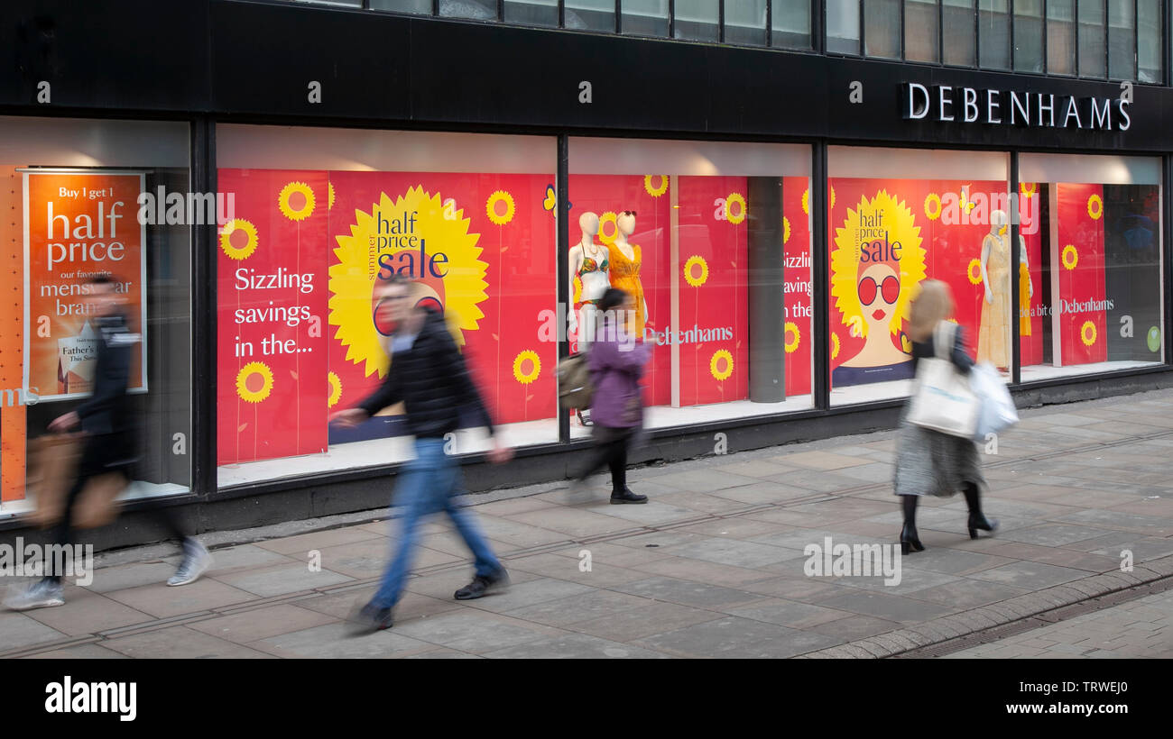 Manchester, UK. 12th June 2019. Debenhams Summer Sale; People shops