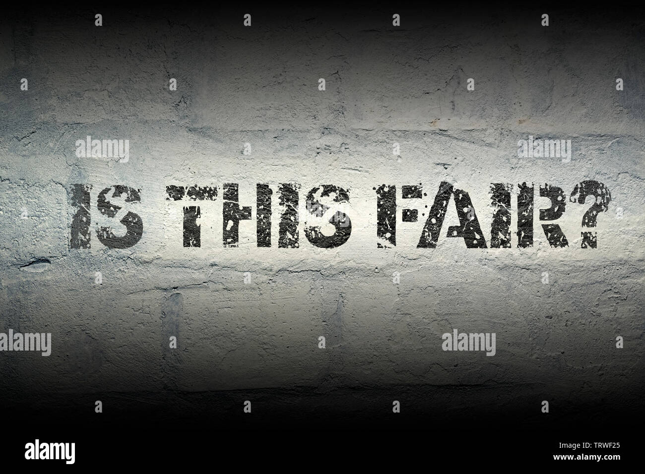 is this fair question stencil print on the grunge white brick wall ...