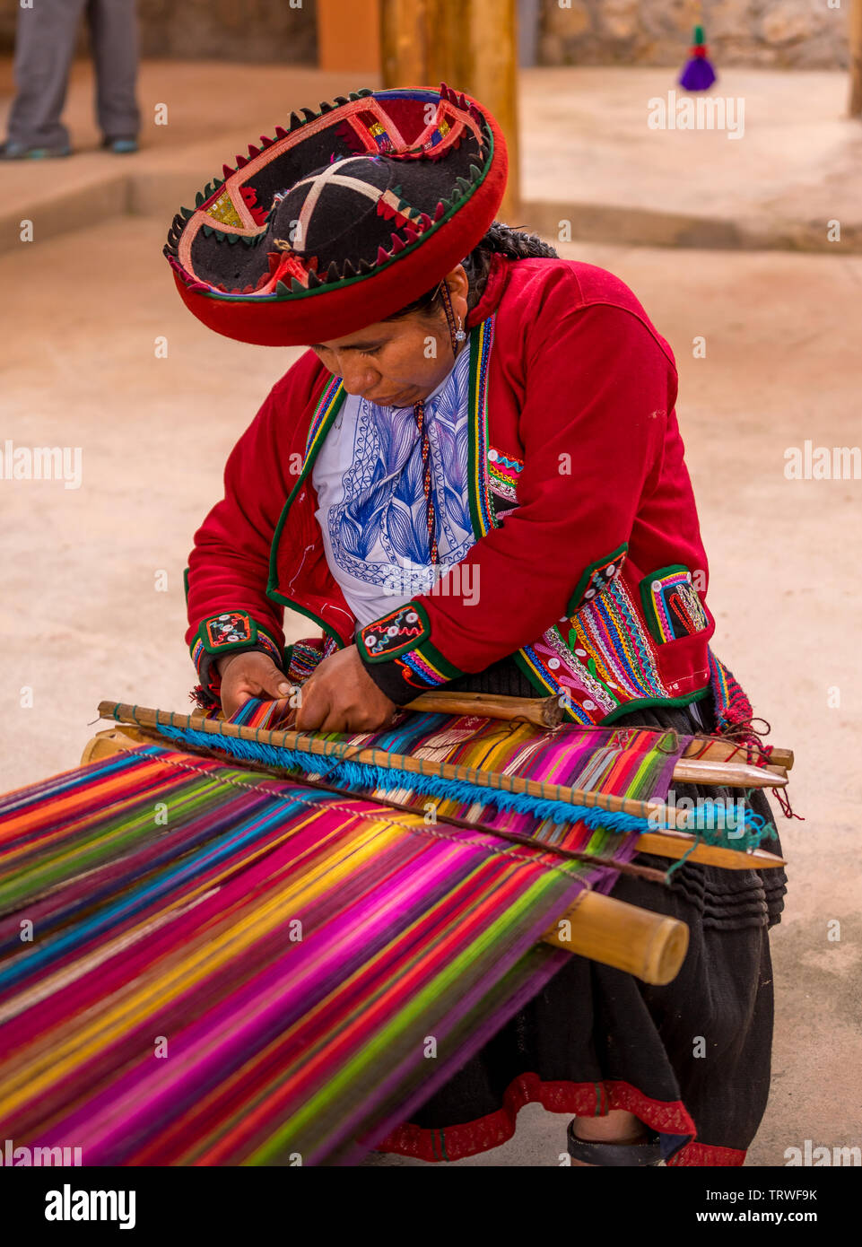 Cuzco, Peru - April 30, 2019. Peruvian woman working on traditional handmade wool production Stock Photo