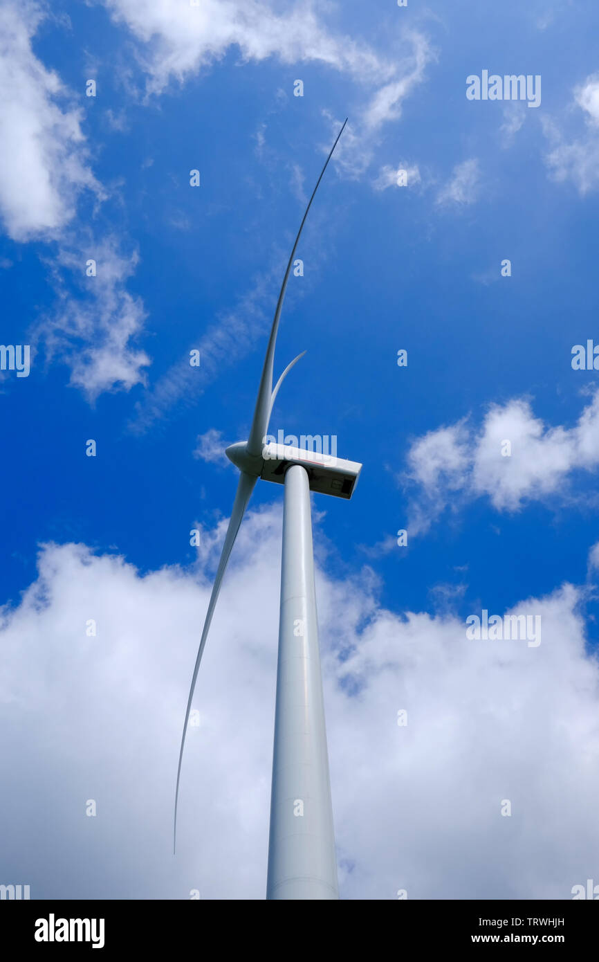 Wind turbine photographed against a blue sky Stock Photo - Alamy