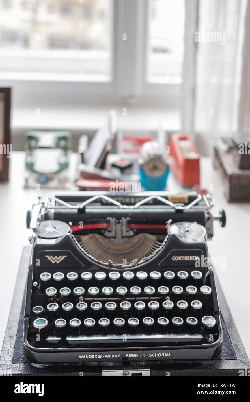 Old German ' Continental' typewriter machine on desktop- selective focus Stock Photo