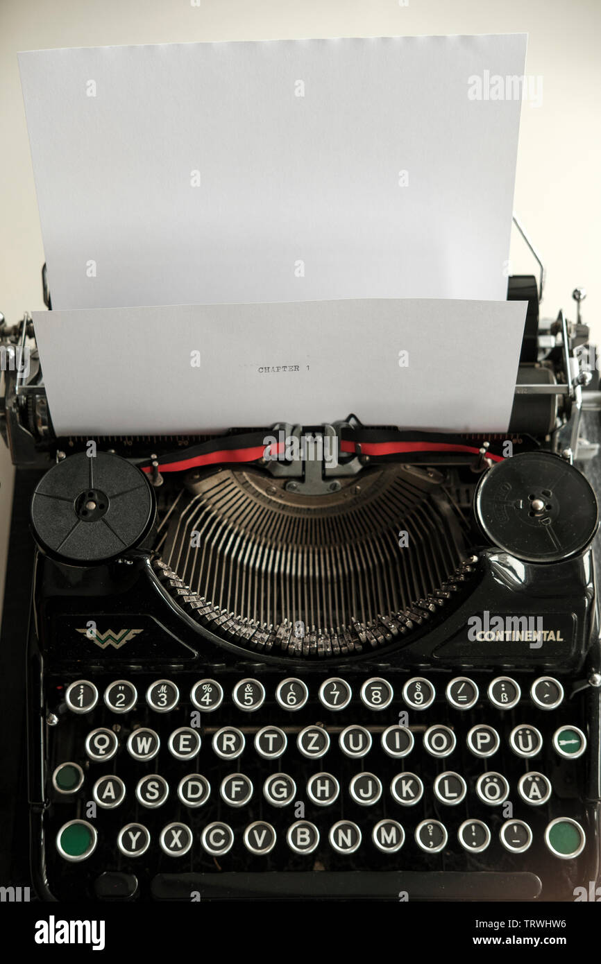 Chapter One- old typewriter with  black white sheet of paper- writers block concept Stock Photo