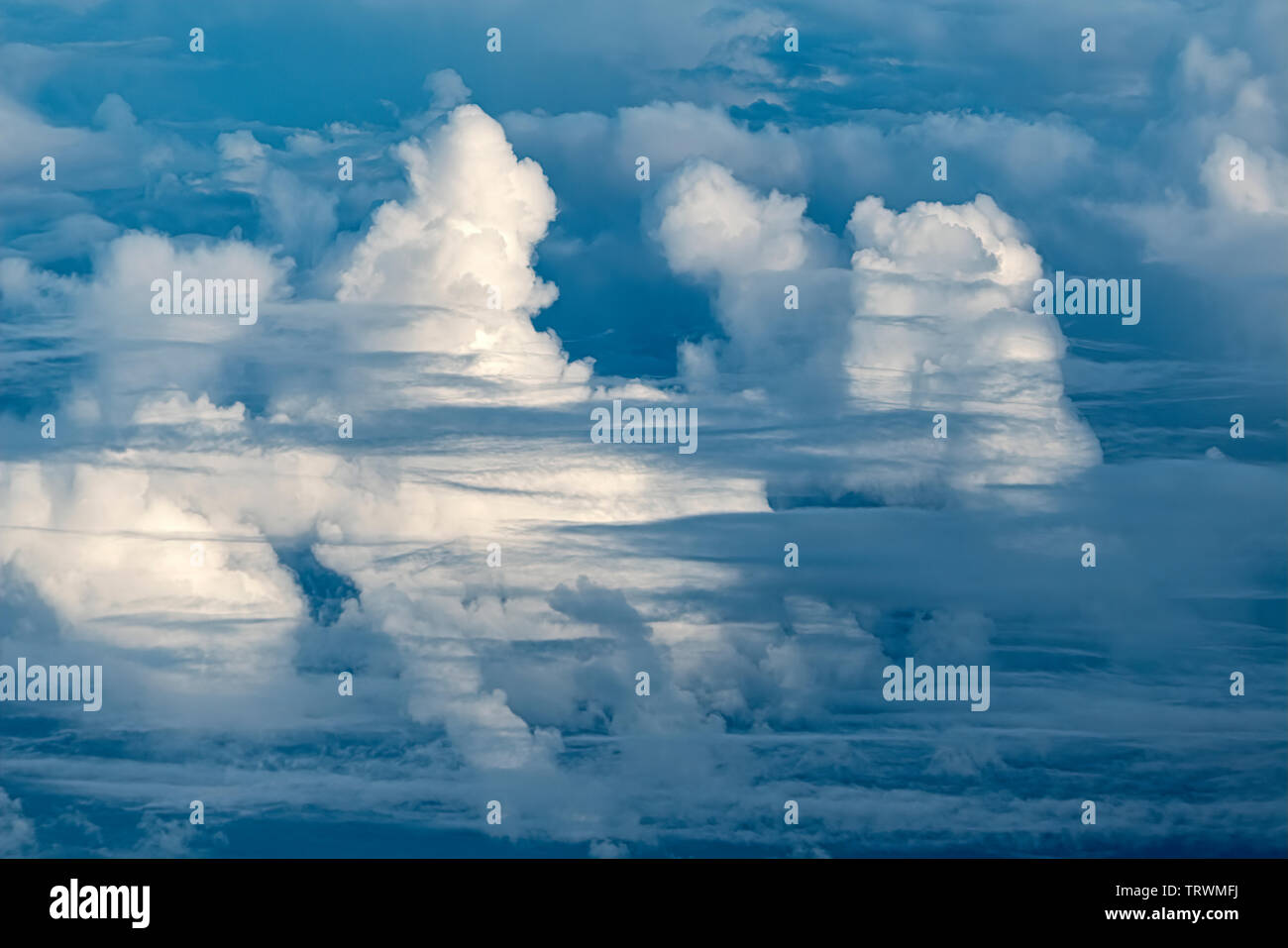 Clouds from airplane from Hawaii to Oregon. Stock Photo