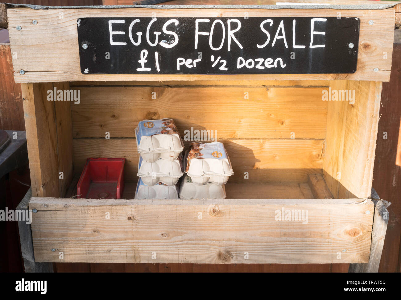 Roadside stall selling free range eggs with an honesty box for payment