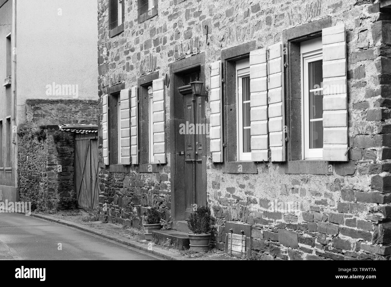 Traditional german house with wooden shutters (Moselkern, Germany