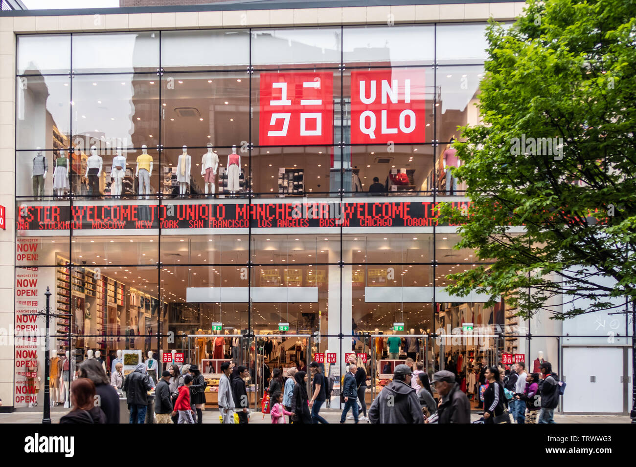 Shoppers walking past the UNIQLO Manchester store, Market Street ...