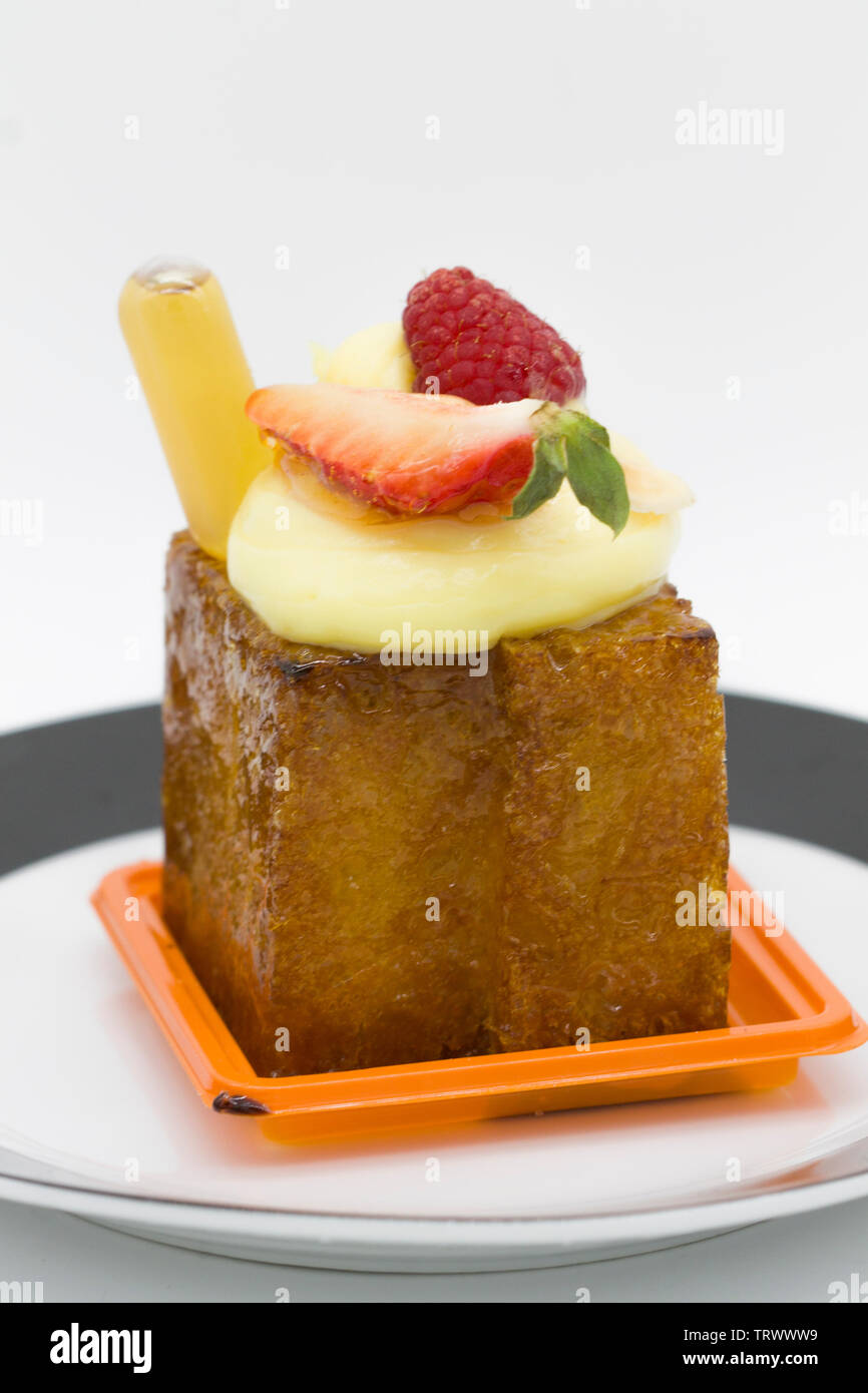 Baba Au Rhum Gateau Francais Typical French Dessert Cake Made With Rhum Cream And Sometimes Fruits Stock Photo Alamy Baba Au Rhum Gateau Francais Typical French Dessert Cake Made With Rhum Cream And Sometimes Fruits Stock Photo Alamy